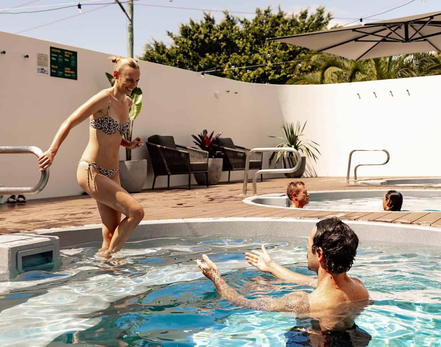 people enjoying diving in magnesium pools